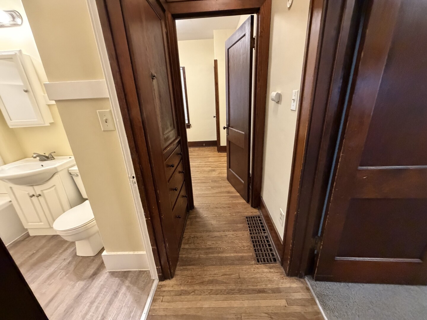 705 West Olive Street Bloomington, IL 61701 - Photo 14 of 32 a bathroom with a sink and a toilet