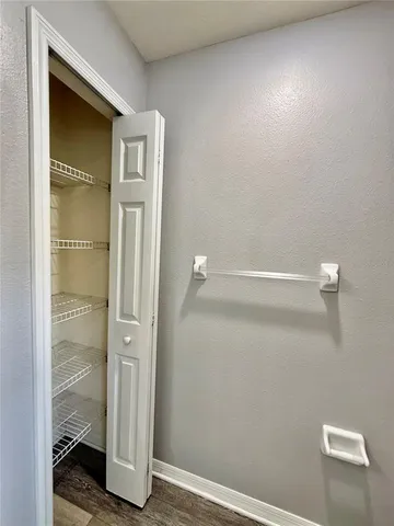wooden floor and window in an empty room