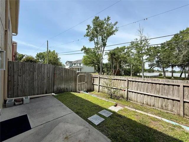 swimming pool view with a seating space