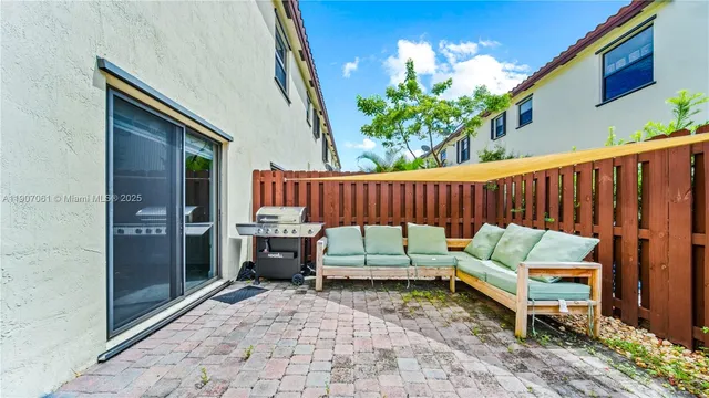 a backyard of a house with a garden