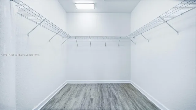 a view of a room with racks on the wall