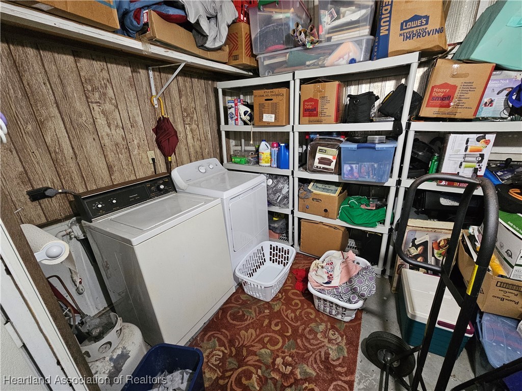 7959 Elliott Road Sebring, FL 33876 - Photo 31 of 31 a utility room with dryer and washer