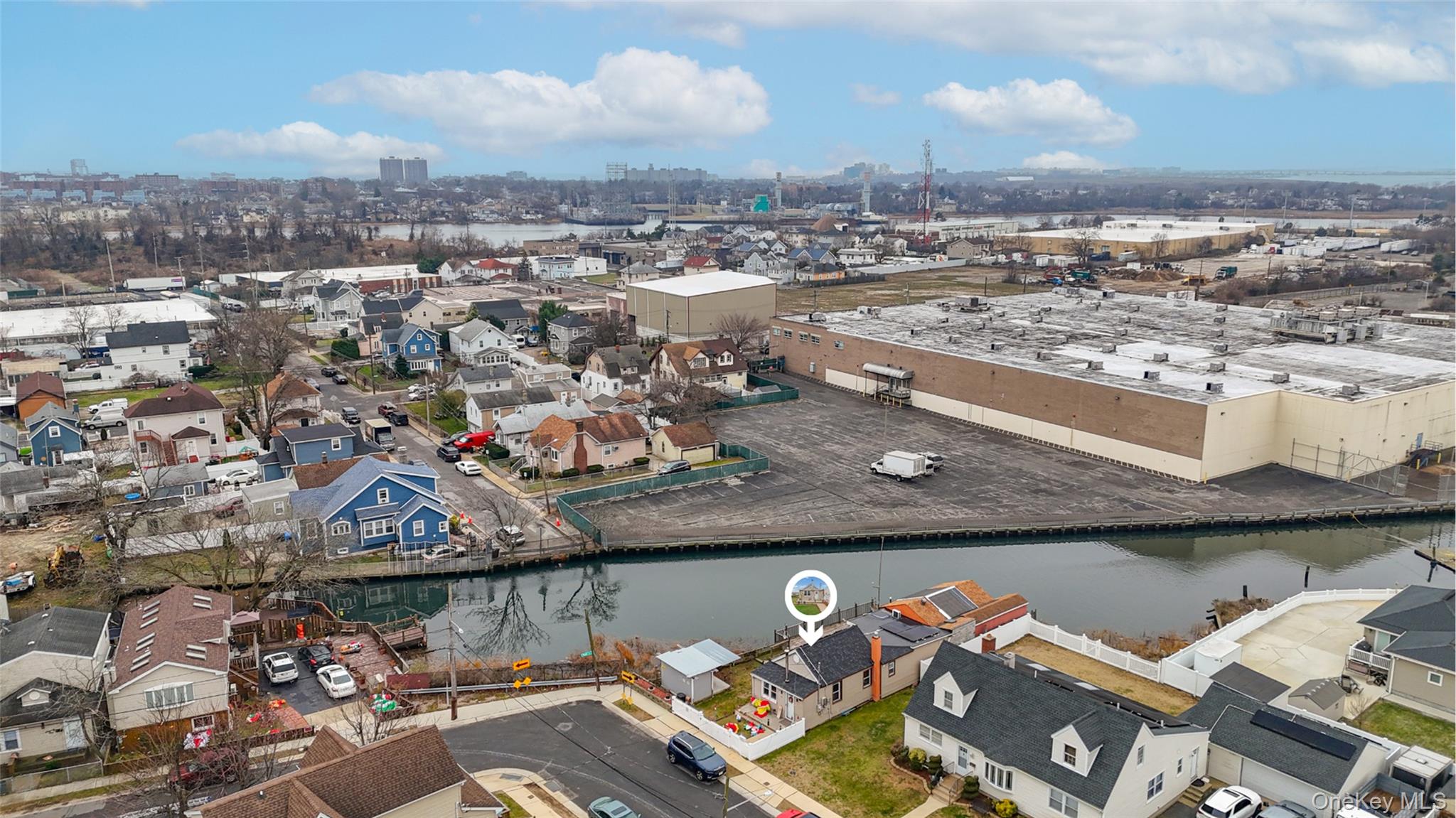 5 Chestnut Road Inwood, NY 11096 - Photo 5 of 20 an aerial view of a house with a lake