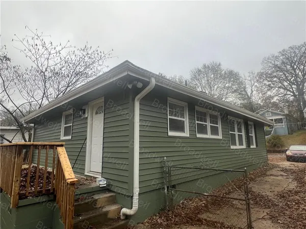 a view of backyard of house
