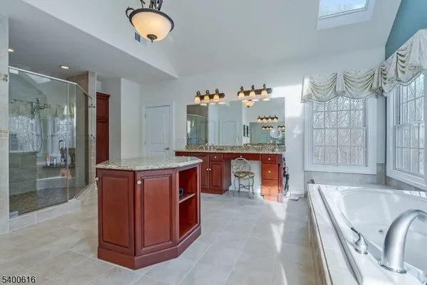 a kitchen with stainless steel appliances granite countertop a stove and a sink