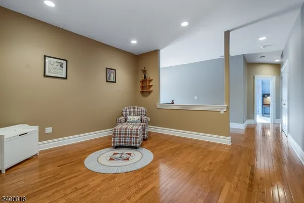 a view of a livingroom with wooden floor