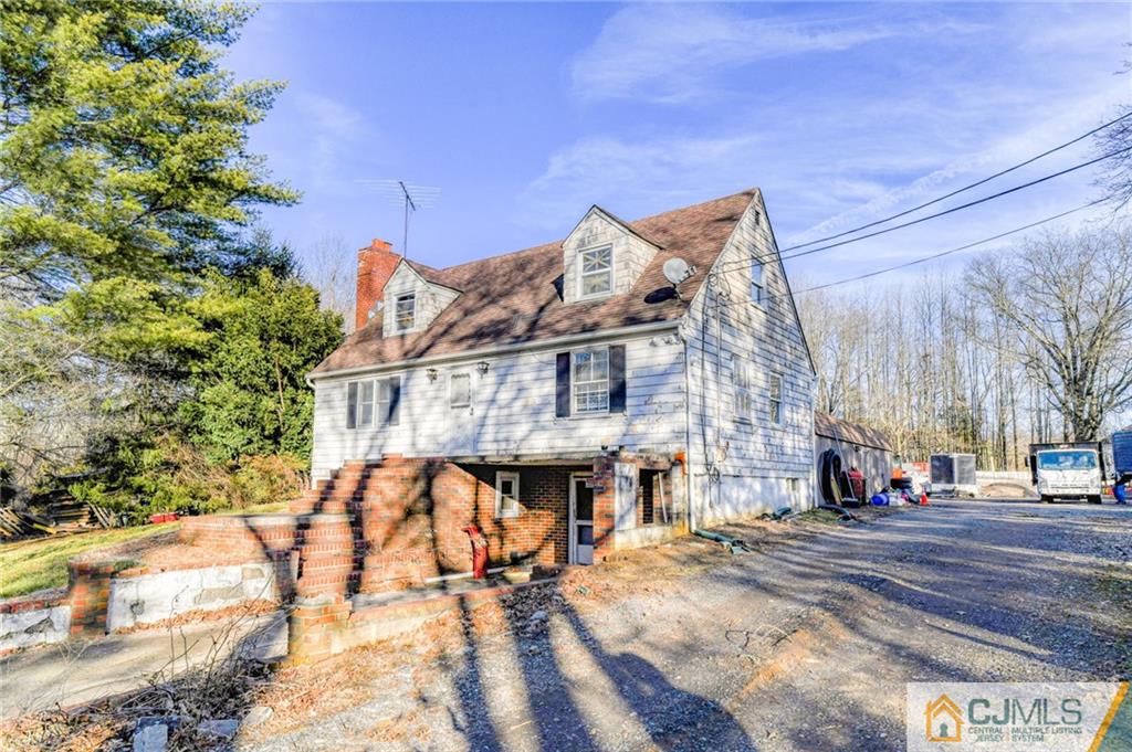 1896 Englishtown Road Old Bridge, NJ 08831 - Photo 1 of 16 a view of a building with a pathway