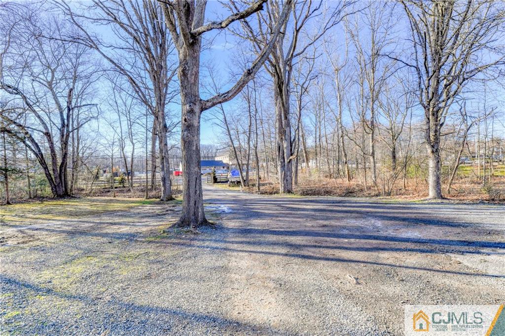 1896 Englishtown Road Old Bridge, NJ 08831 - Photo 6 of 16 a view of street with trees