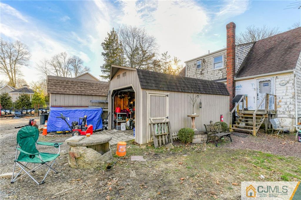 1896 Englishtown Road Old Bridge, NJ 08831 - Photo 9 of 16 a view of outdoor space yard deck patio and fire pit