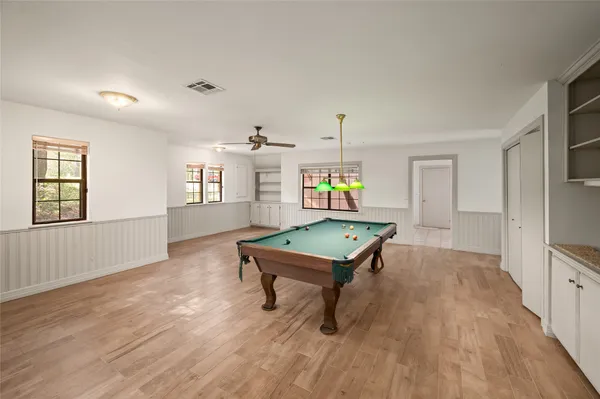 a living room with furniture and window