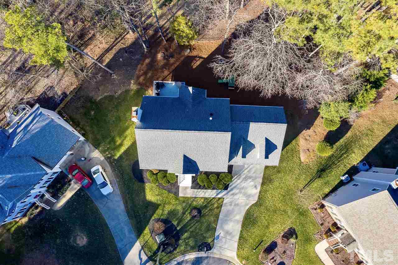 4708 Alistar Court Raleigh, NC 27612 - Photo 2 of 30 an aerial view of a house with a yard