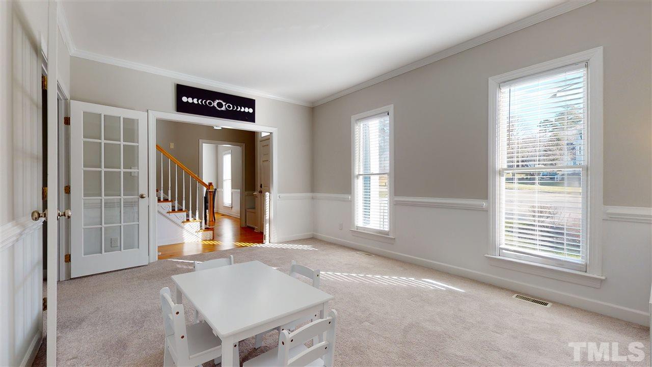 4708 Alistar Court Raleigh, NC 27612 - Photo 6 of 30 a view of livingroom with furniture and windows
