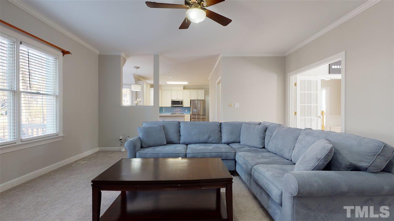 4708 Alistar Court Raleigh, NC 27612 - Photo 10 of 30 a living room with furniture and a window