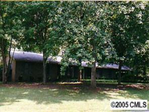 3321 Lake Shore Road South Denver, NC 28037 - Photo 1 of 8 a view of a house with a yard balcony and tree