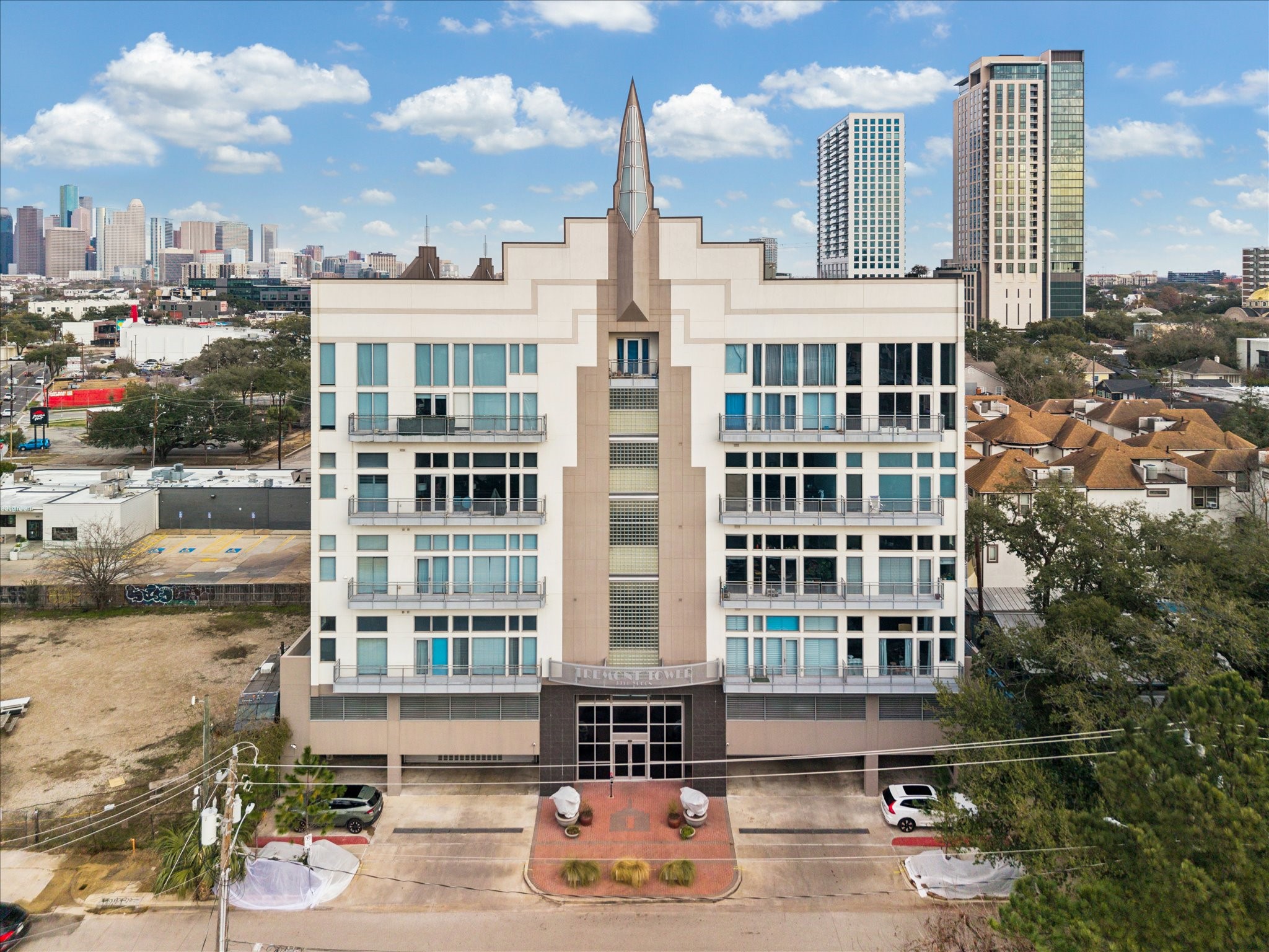 a front view of a building with street view