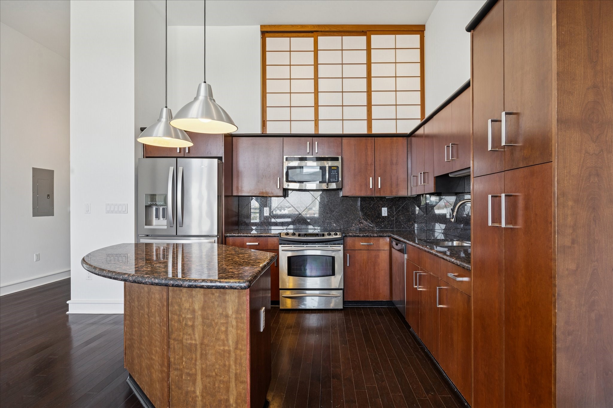 3311 Yupon Street, Unit 609 Houston, TX 77006 - Photo 2 of 16 a kitchen with stainless steel appliances granite countertop a stove a refrigerator and a sink