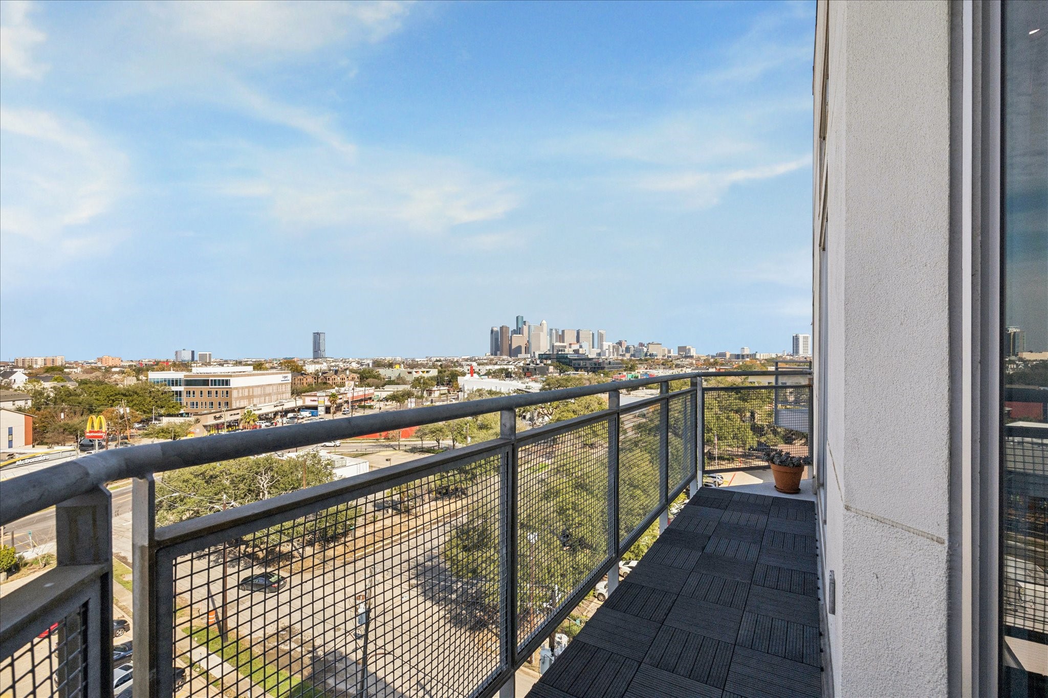 3311 Yupon Street, Unit 609 Houston, TX 77006 - Photo 4 of 16 a city view from a balcony