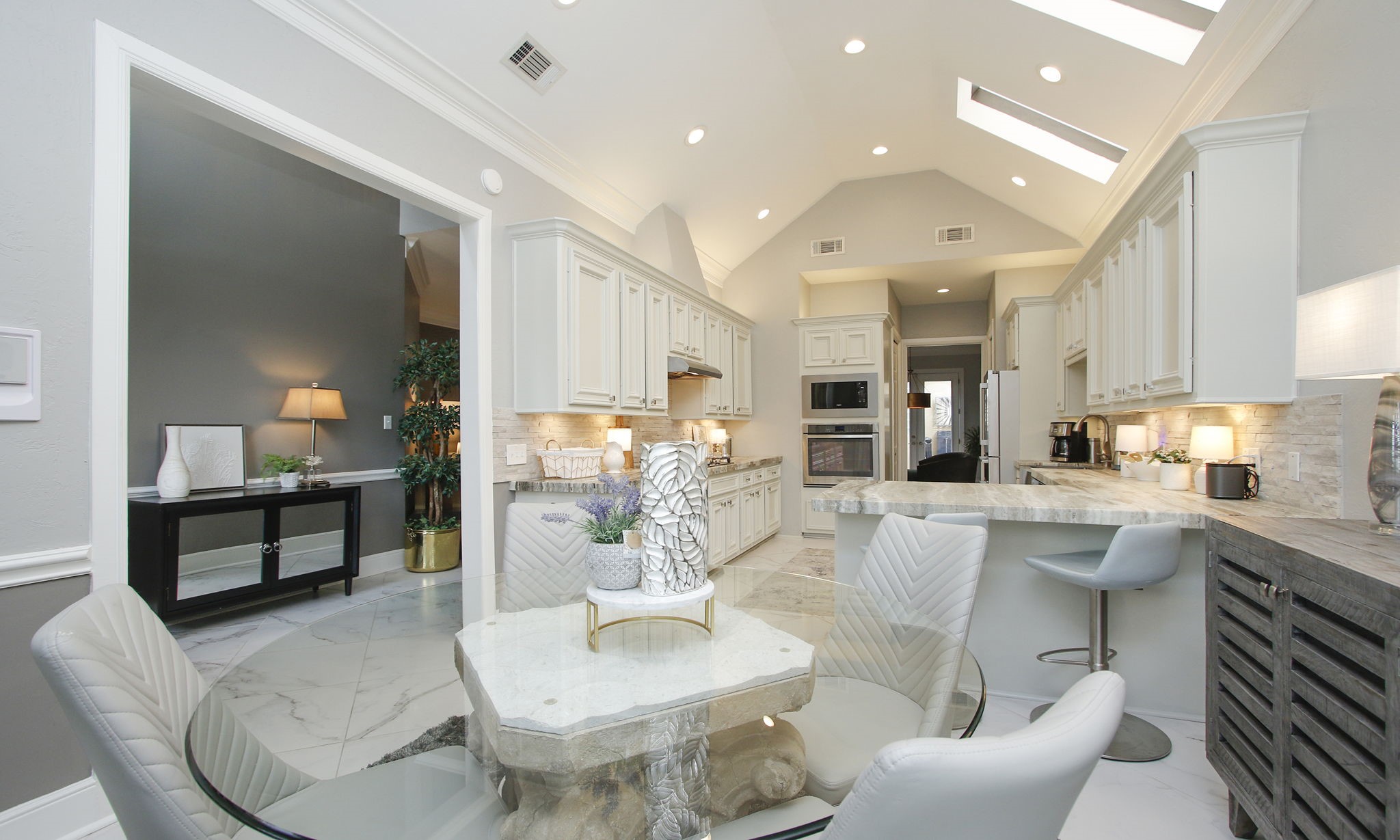 16610 Manningtree Lane Spring, TX 77379 - Photo 28 of 50 This view of the kitchen shows the openness and large size of this gorgeous designer influenced remodel.
