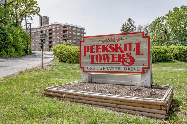 a sign on the side of the park