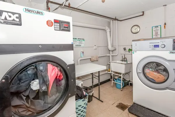 a view of livingroom with washer and dryer