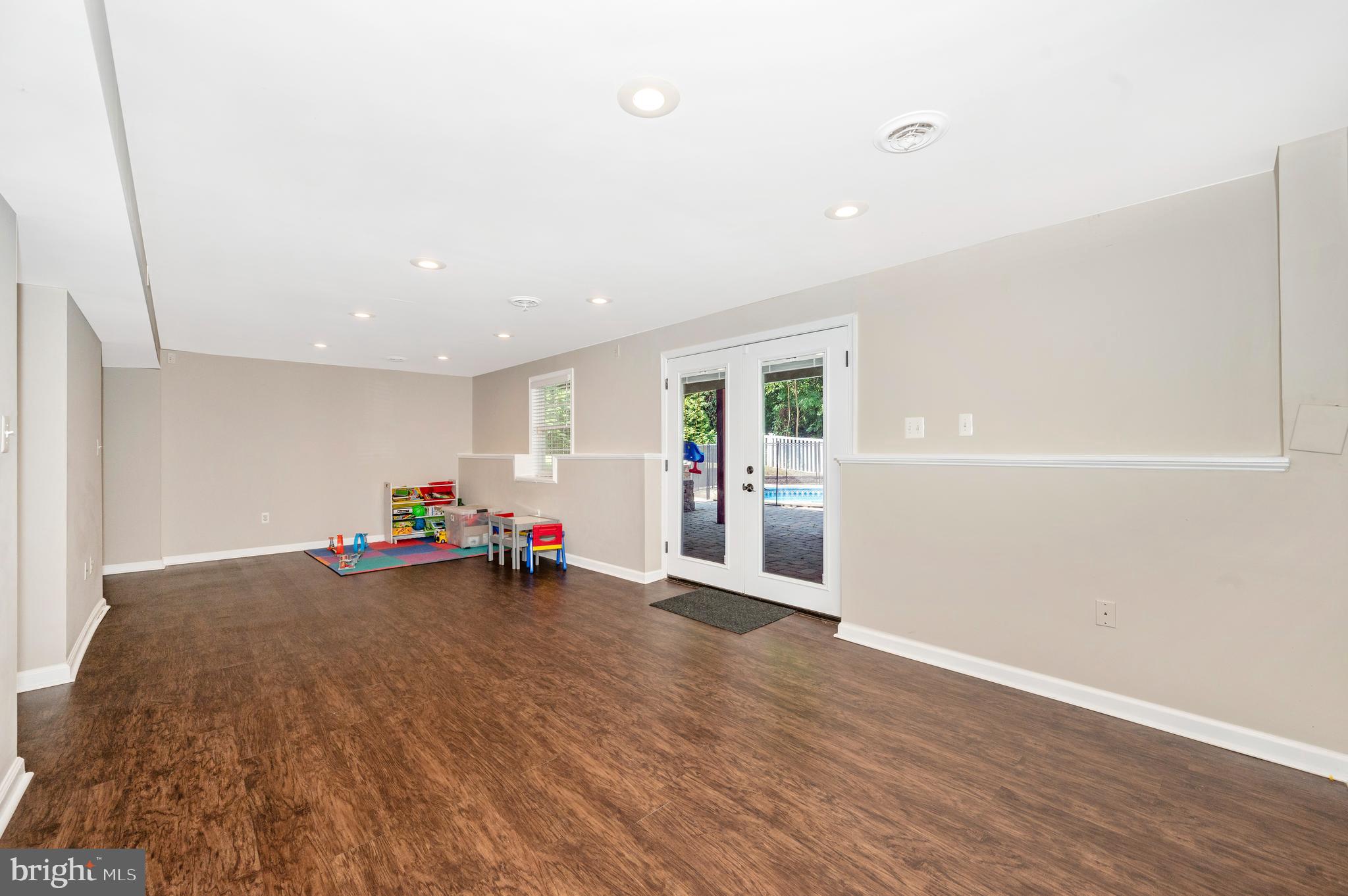447 Delaware Road Frederick, MD 21701 - Photo 29 of 52 Lower level recreation room opens to back yard