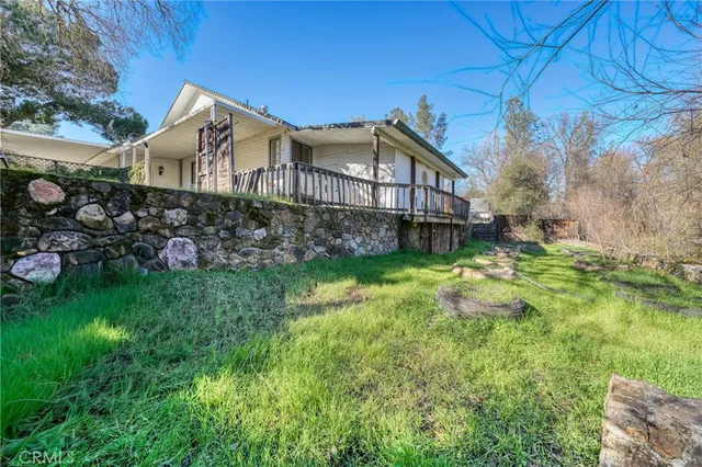 a backyard of a house with lots of green space