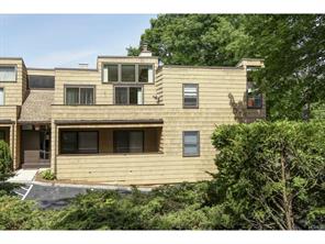216 Purchase Street, Unit G Rye, NY 10580 - Photo 1 of 1 a house that has a large window in front of it