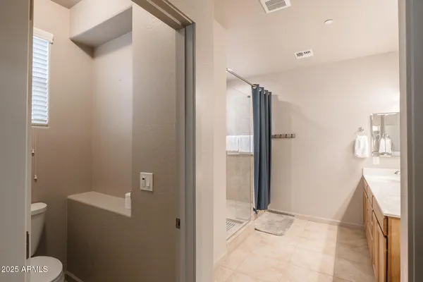 a bathroom with a sink and toilet