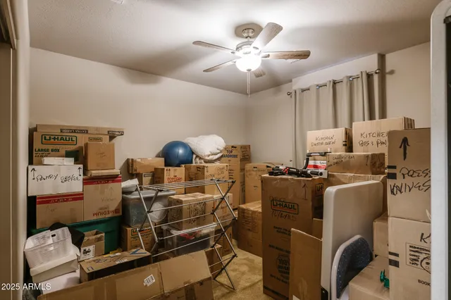 a view of a workspace with furniture