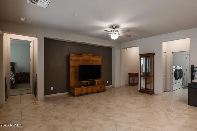 a view of a livingroom with a flat screen tv
