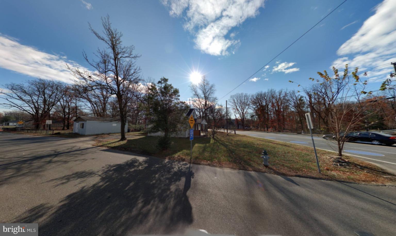 9130 D'Arcy Road Upper Marlboro, MD 20774 - Photo 3 of 38 Sunny day at a quiet intersection.