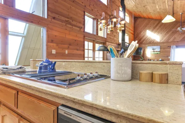 a bedroom with furniture and wooden floor