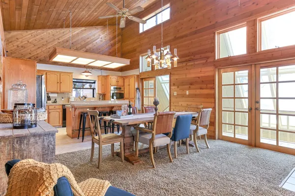 a bedroom with a bed and a night stand