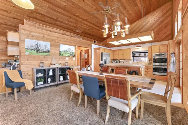 a bathroom with a double vanity sink and mirror