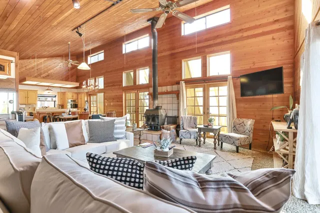 a kitchen with stainless steel appliances granite countertop a stove and a refrigerator