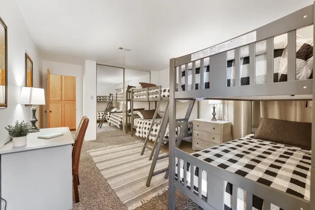 a view of a livingroom with chairs