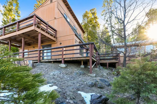 a bathroom with a shower and a sink