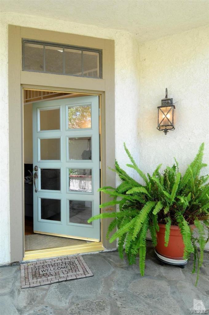 822 Congressional Road Simi Valley, CA 93065 - Photo 8 of 36 a potted plant sitting in front of a door