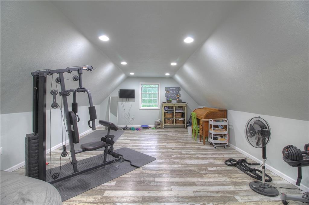 569 Leeper Road Georgetown, PA 15043 - Photo 15 of 25 BONUS ROOM! With HEATED floors. Currently used as a workout room. Can make a massive office, kids play space, another room! So many options!
