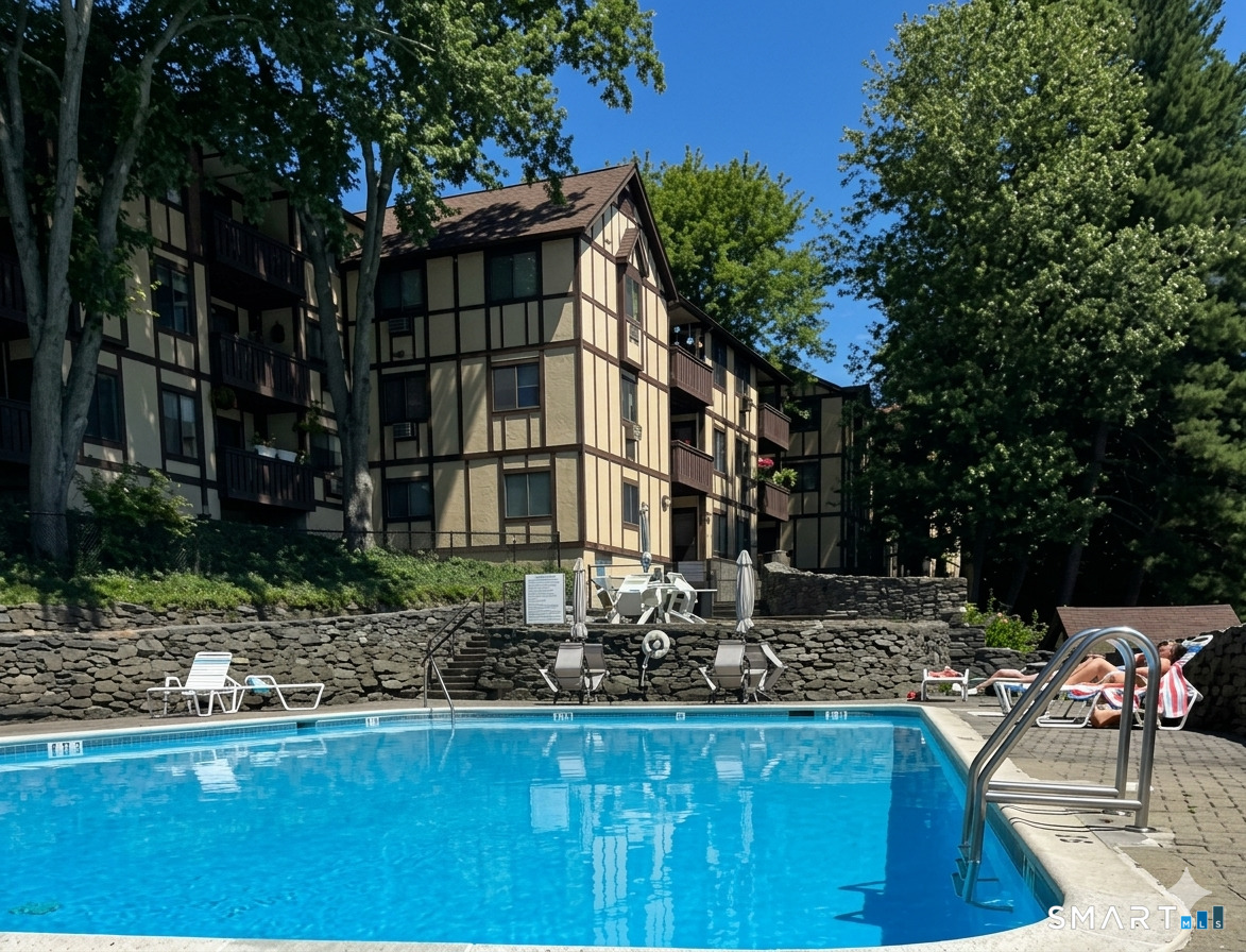 125 Warner Hill Road, Unit 67 Stratford, CT 06614 - Photo 3 of 14 Summer will be here in a flash, and this gorgeous pool is ready to turn ordinary summer days into your own private escape.
