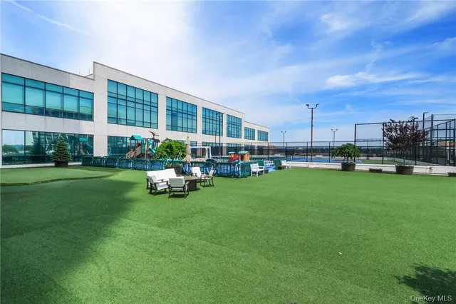 a childrens park with lots of swings and slides