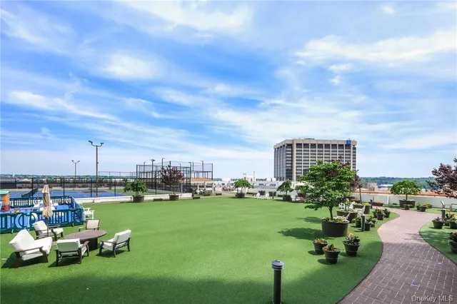 a garden view with a sitting space