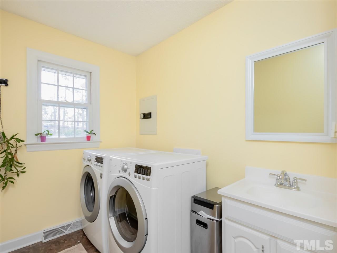 3745 Lassiter Mill Road Raleigh, NC 27609 - Photo 14 of 25 a utility room with dryer and washer