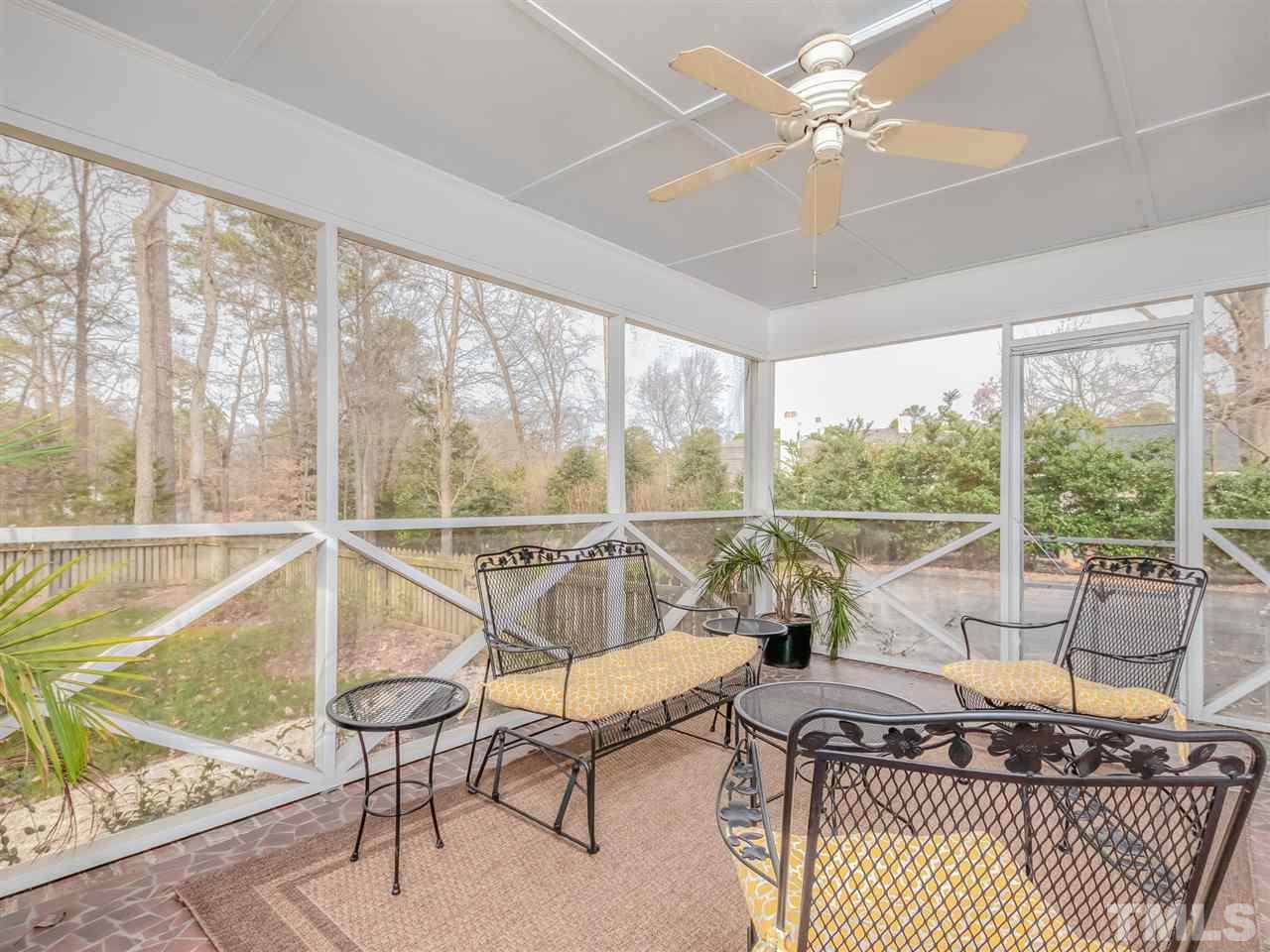 3745 Lassiter Mill Road Raleigh, NC 27609 - Photo 22 of 25 a living room with furniture and a large window with outer view