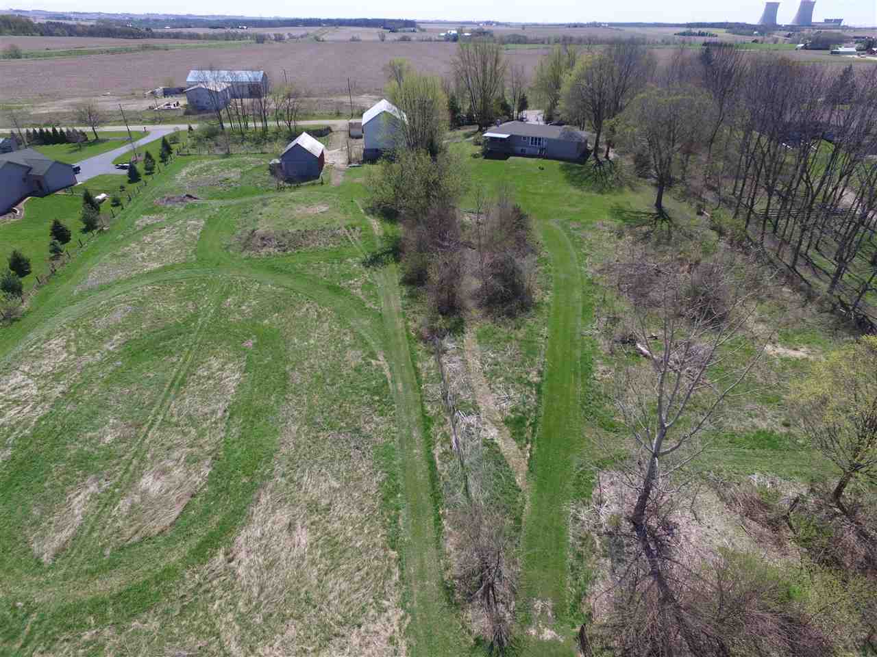 4484 East Walden Road Byron, IL 61010 - Photo 6 of 22 a view of a lush green forest