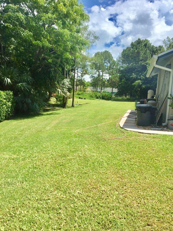 13047 42nd Road North Royal Palm Beach, FL 33411 - Photo 32 of 34 42ndRdNYardSide