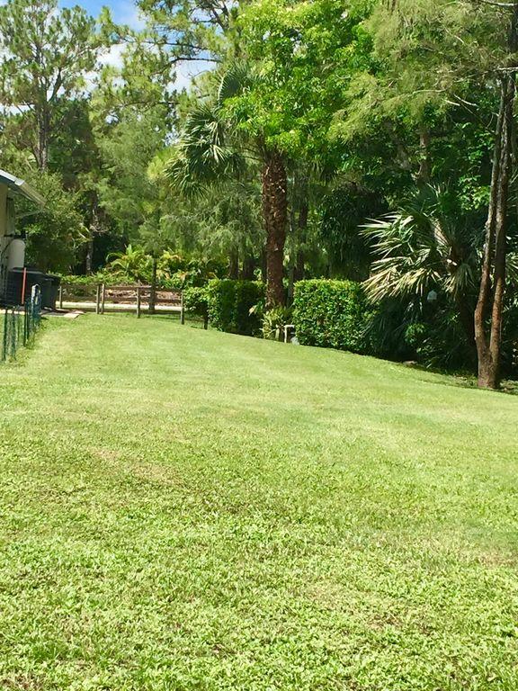 13047 42nd Road North Royal Palm Beach, FL 33411 - Photo 33 of 34 42ndRdNYardside2