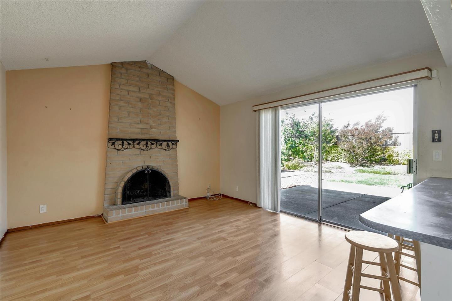 1045 Seascape Circle Rodeo, CA 94572 - Photo 4 of 6 a view of empty room with wooden floor and fan