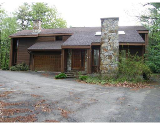 26 Perry Road Athol, MA 01331 - Photo 1 of 10 a front view of a house with garden
