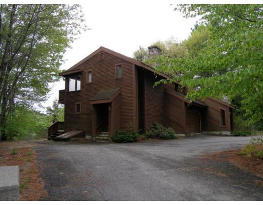 26 Perry Road Athol, MA 01331 - Photo 2 of 10 a front view of a house with a yard